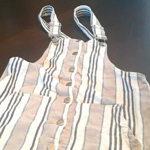 Super cute overall skirt fits sizes 4-8